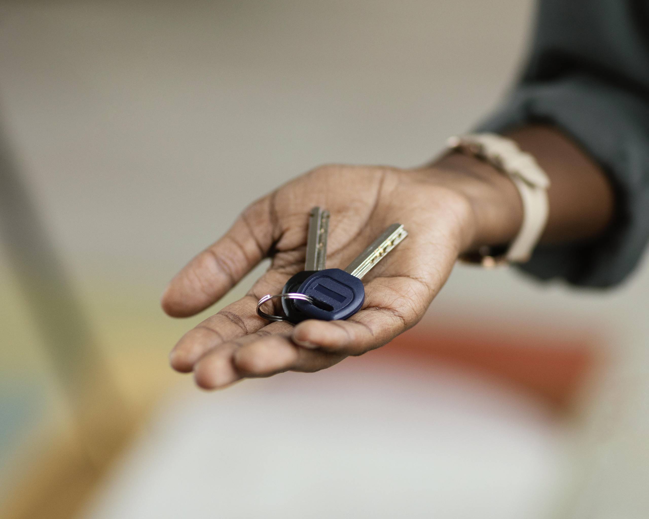woman-holding-keys-her-new-home